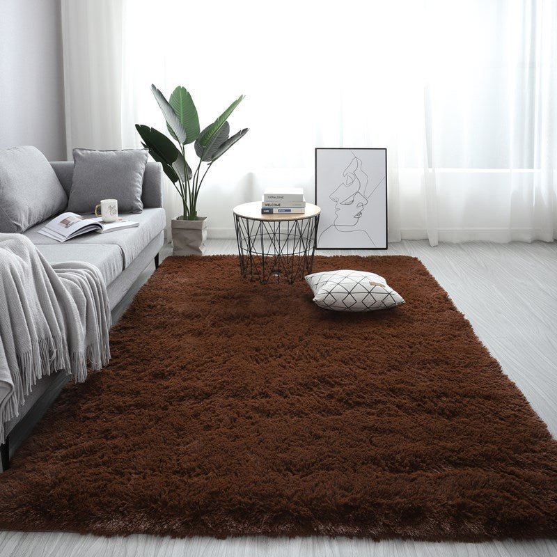 Nordic fluffy rectangle rug in white placed in a cozy living room with soft lighting

