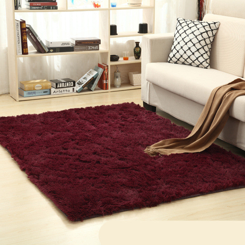 Soft carpet placed under a coffee table and beside a sofa in a cozy living room with neutral tones

