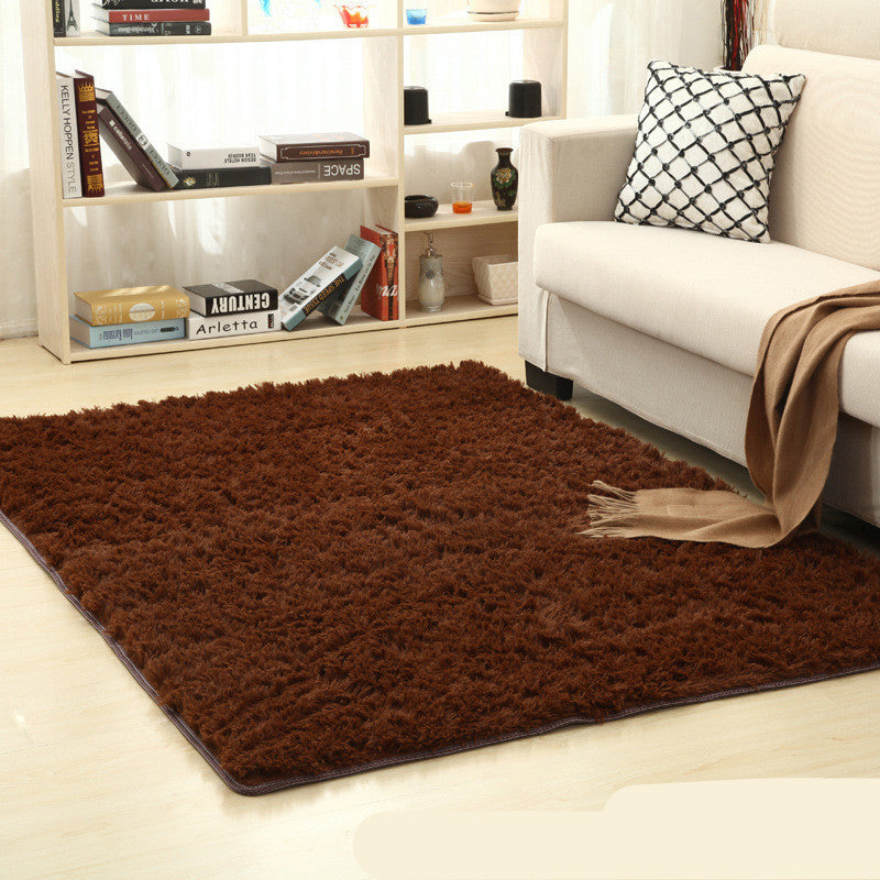 Soft carpet placed under a coffee table and beside a sofa in a cozy living room with neutral tones

