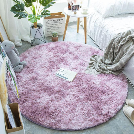 Nordic round silk wool carpet placed in a minimalist living room with natural light and cozy furniture

