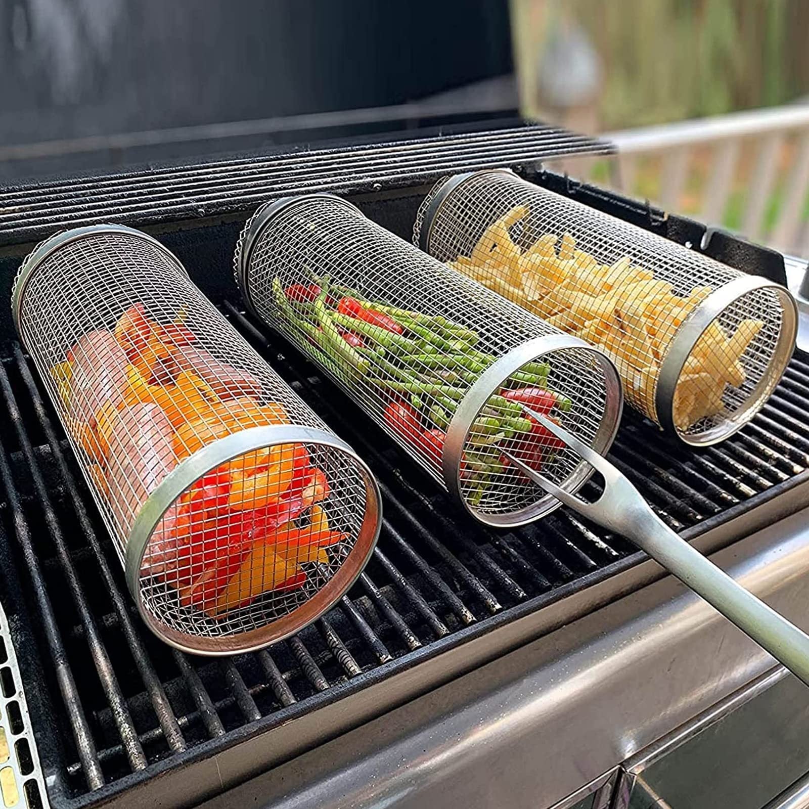 Portable rolling grilling basket for BBQ and outdoor cooking.