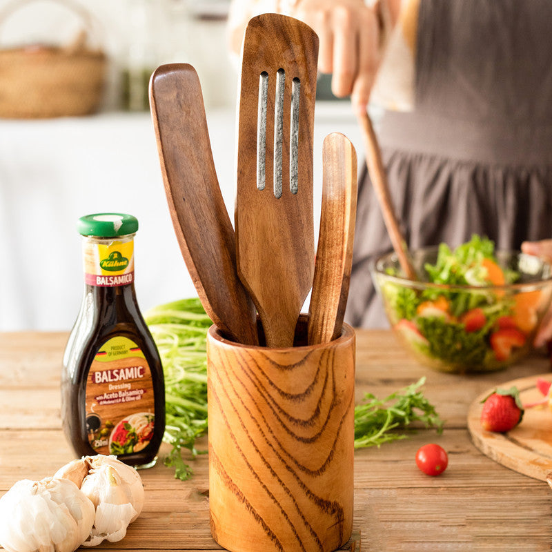 Handmade teak wood cooking spatula for salads and kitchen use.