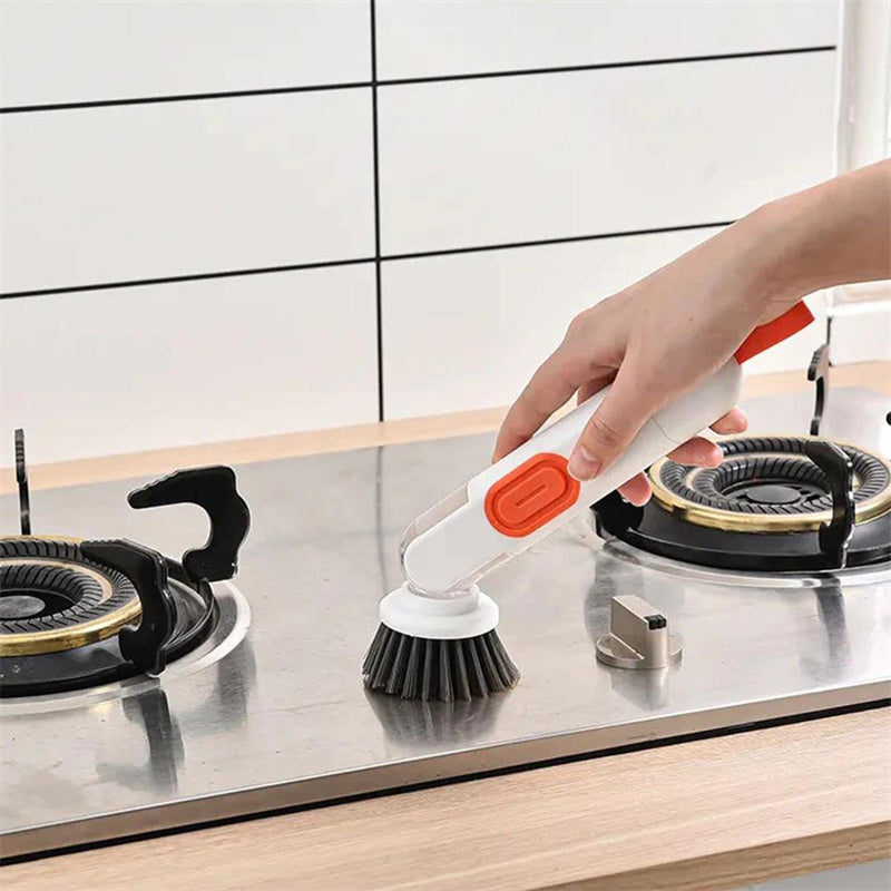 Multi-functional kitchen cleaning brush with long handle and liquid dispenser.