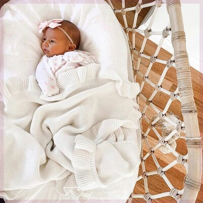 Newborn swaddle wrap

Ruffle baby blanket

