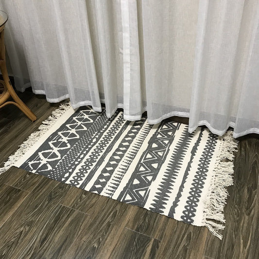 Woven tassel carpet placed in a cozy living room with neutral furniture and boho accents

