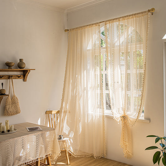 Wood color lace curtain hanging as window screen in a cozy living room

