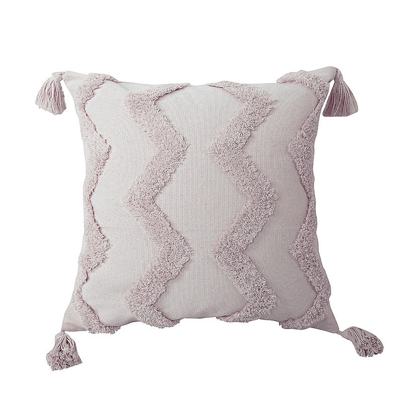Boho tufted pillow cushion cover on a neutral-toned sofa with textured detailing

