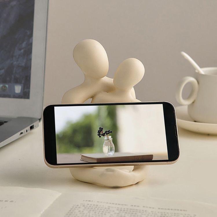 Romantic couple resin statue for modern home décor and gifting.