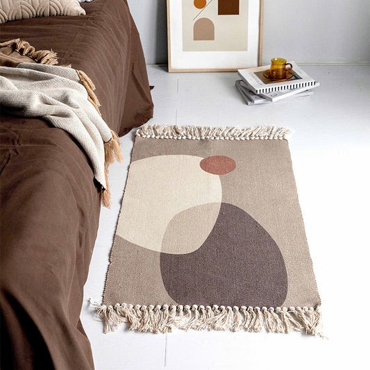 Small floor mat placed beside a living room sofa and coffee table in a modern, cozy space

