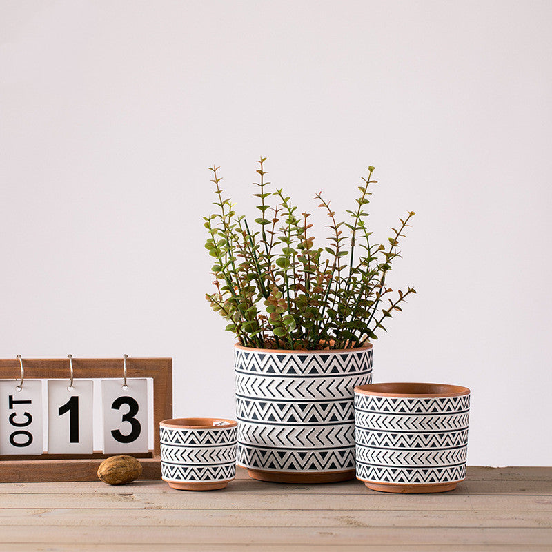 Nordic style ceramic geometric flower pots for modern home décor.