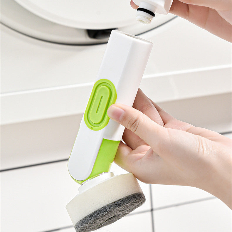 Multi-functional kitchen cleaning brush with long handle and liquid dispenser.