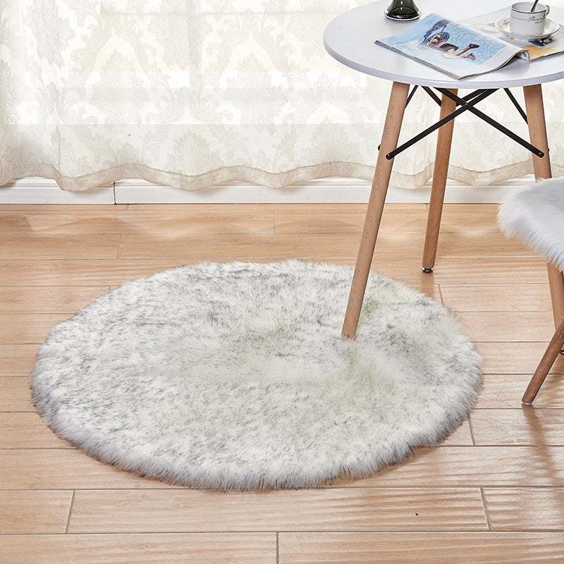 Plush carpet in a cozy home living room with modern furniture and warm lighting

