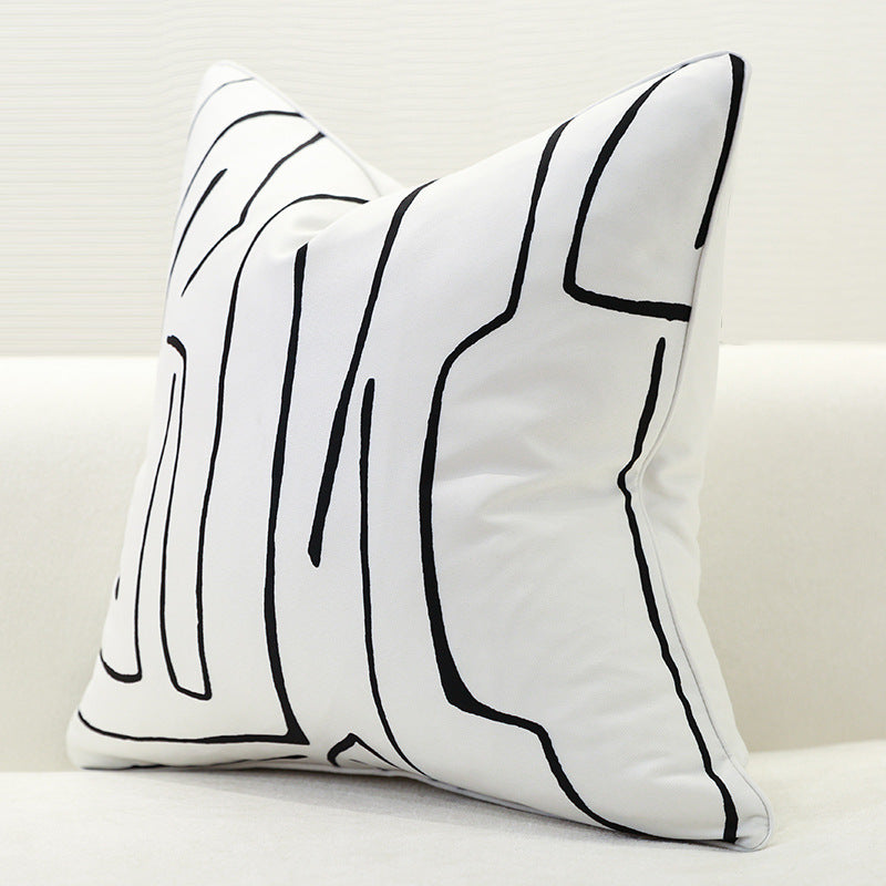Nordic-style decorative cushion on a minimalist sofa with neutral tones

