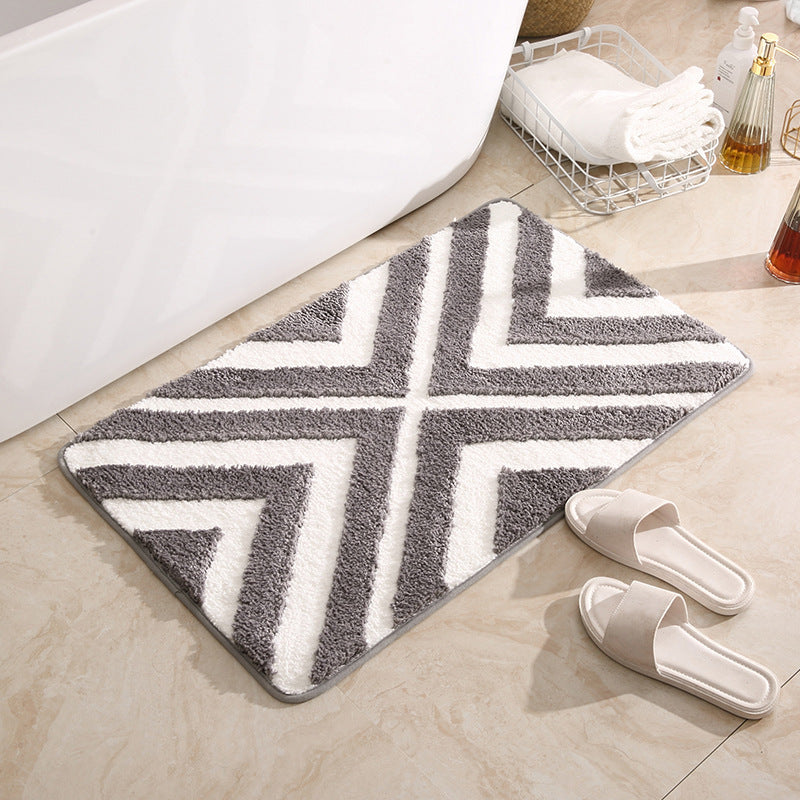 Tufted door mat placed at a living room entrance with modern décor and soft natural lighting

