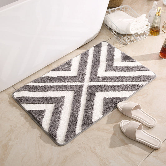 Tufted door mat placed at a living room entrance with modern décor and soft natural lighting

