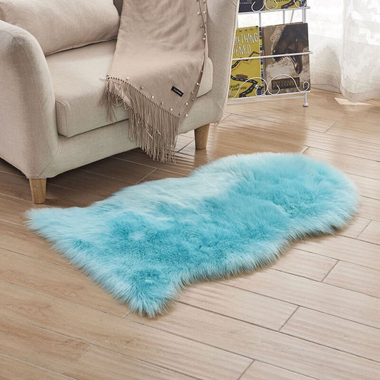Plush carpet floor mat placed in a bedroom near the bed on a wooden floor

