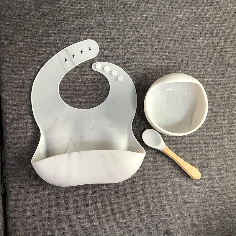 Silicone bib and spoon

Wooden baby spoon

