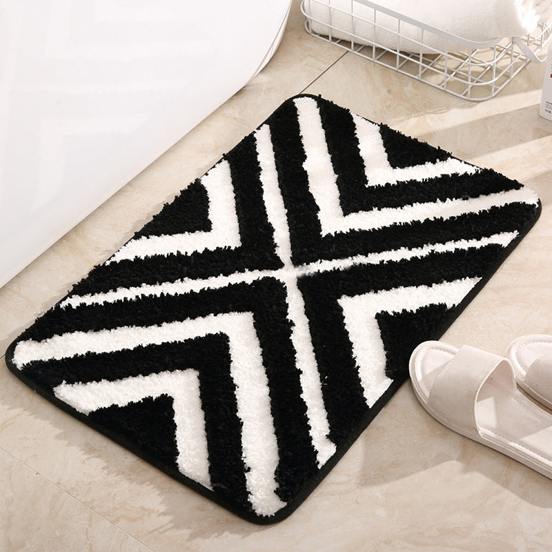 Tufted door mat placed at a living room entrance with modern décor and soft natural lighting

