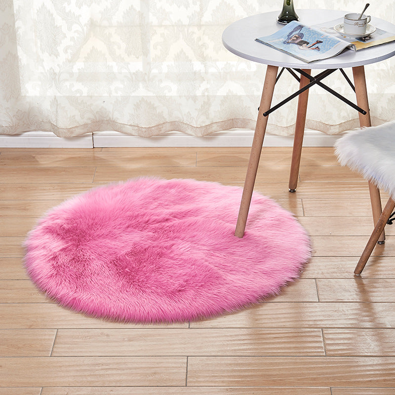 Plush carpet in a cozy home living room with modern furniture and warm lighting

