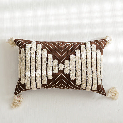 Nordic-style decorative cushion on a minimalist sofa with neutral tones

