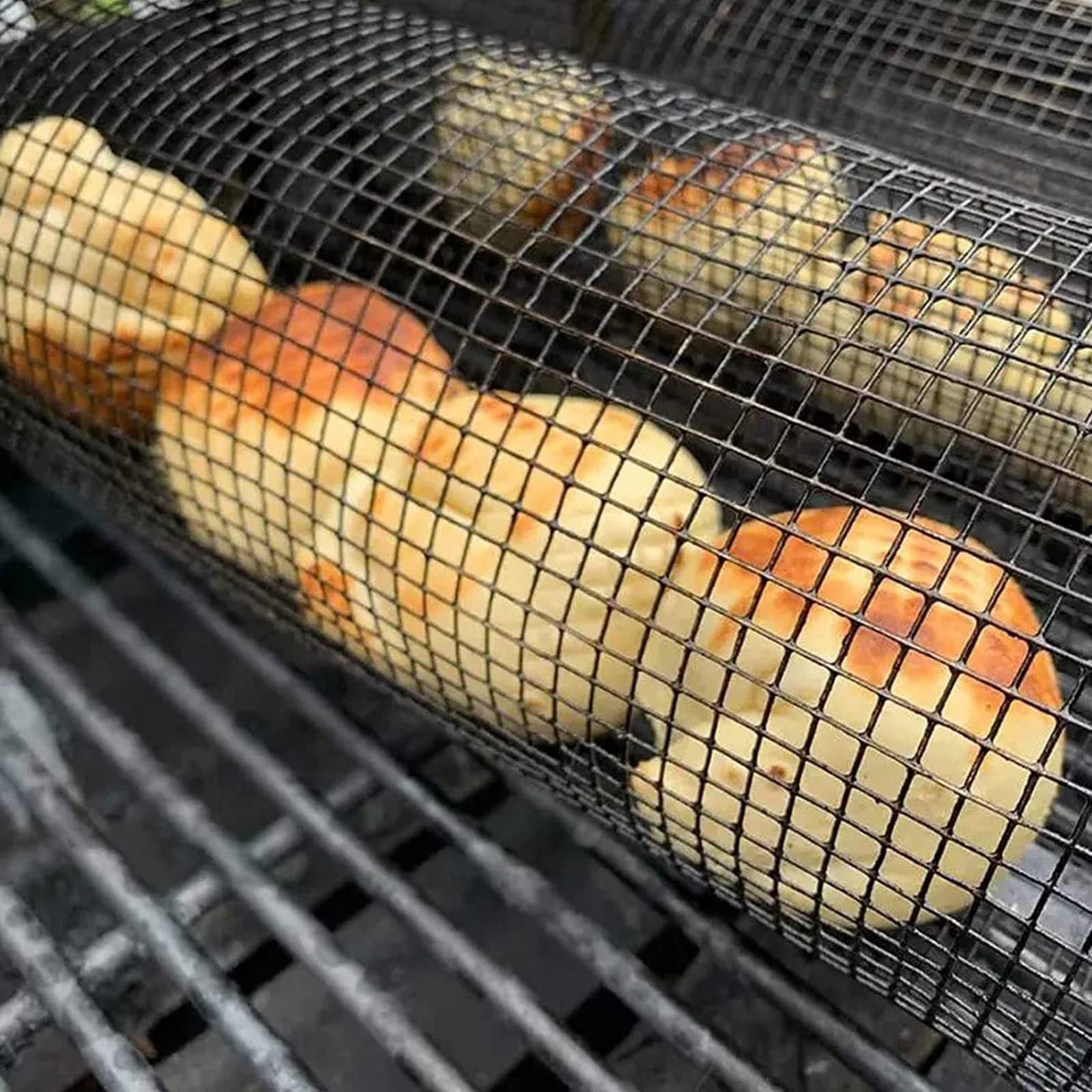 Portable rolling grilling basket for BBQ and outdoor cooking.